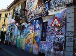 Graffiti on a building in the Darsena area [28]