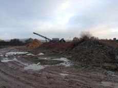 Landfill area adjoining the site