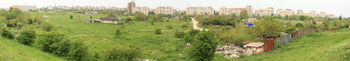 (13) panoramic view from the west side toward the neighboring area - improvised dwellings