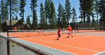 Tennis playing near the lake